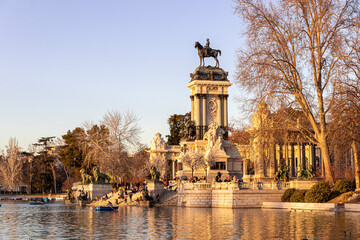 Fototapeta na wymiar Madrid, Spain. Monument to Alfonso XII in Buen Retiro Park (El Retiro), situated on the east edge of an artificial lake near the center of the park