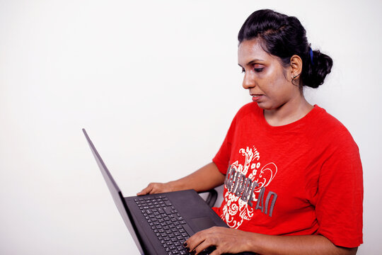 young woman working using computer laptop concentrated and confident