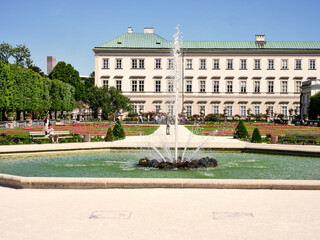 Mirabell Palace and beautiful garden fountain in Salzburg, Austria