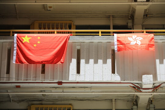 flags for celebrate the 25th anniversary of the establishment of the Hong Kong Special Administrative in Ping Shek Estate, Hong Kong