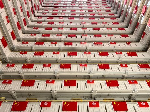 flags for celebrate the 25th anniversary of the establishment of the Hong Kong Special Administrative in Ping Shek Estate, Hong Kong