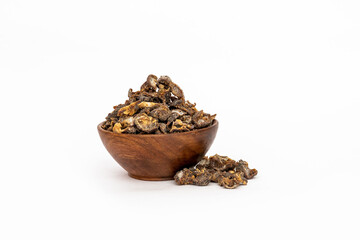 amla seedless or Phyllantus emblica L in wooden bowl 