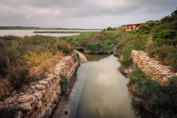 East Coast of Sicily in Italy, Europe on a warm spring day at the coast with old structures
