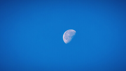 Moon in a blue sky