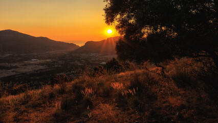 Evening in the coastal hills of Sicily on Monte Pellegrino near Palermo in Summer on a warm evening sunset