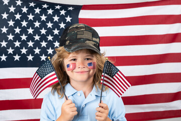 Child american patriot. Kid celebration independence day 4th of july. United States of America concept. Child with american flag. Memorial day. Funny kids face with american flag on cheek.