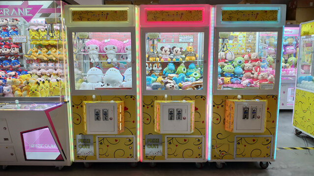 Row Of Toy Claw Crane Game Vending Machine