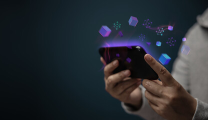 Metaverse, Web3 and Blockchain Technology Concepts. Closeup of Hand Using Smartphone for Connect a...