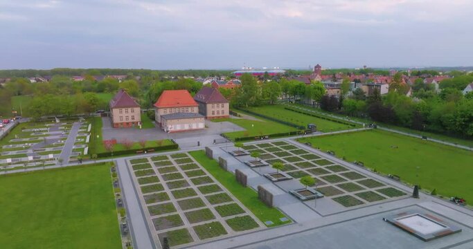 Aerial view of the wooden broadcasting tower in Gliwice with the city of Gliwice in the background. The concept of the largest wooden tower in the world. Wooden construction from a drone.