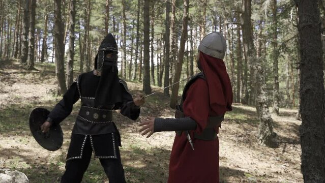 Mongolian soldier and Byzantine soldier fighting in the forest.
Vanguard, historical periods, war style, infantry units, battlefield, historical reenactment, byzantine soldiers, mongolian soldiers. An