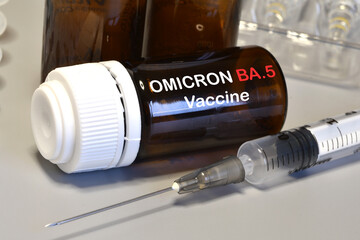 Covid-19 Omicron BA.5 Variant Strain Vaccine. Syringe and Vaccine. Treatment for Coronavirus...