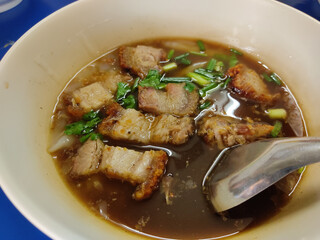 roll noodle soup with crispy pork 