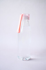 fresh drinking water in a pink color bottle 