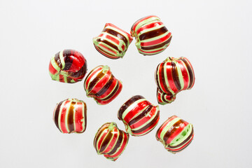 Colorful striped candies. Akide Sekeri