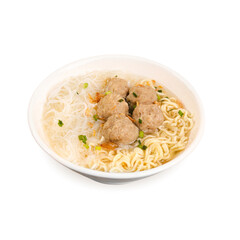 Hot traditional indonesian meatballs bakso with noodles, vegetables and gravy broth