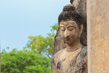 Standing Buddha image made from stone, Leela attitude - 513154406