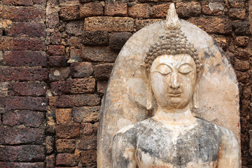 Standing Buddha image made from stone, Leela attitude - 513154407