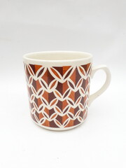 Mid-century modern ceramic mug with spray painted pattern