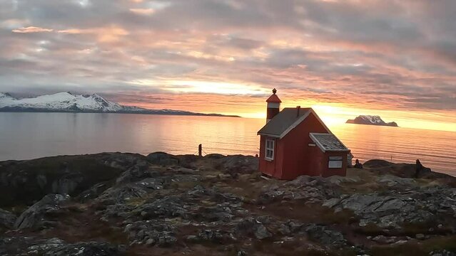 Lyngstuva lighthouse during sunset or sunrise, Lyngen, Lyngenfjord, Troms og Finnmark, Norway