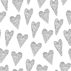 Abstract seamless pattern of hearts. Fill the polka dot. Black on a white background. Prints, packaging design, textiles, bedding and wallpaper.