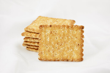 Crispy cracker according to recipes. Sweet cookies on a bun background