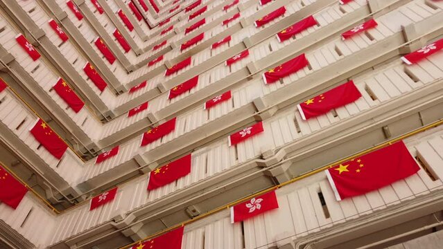 flags for celebrate the 25th anniversary of the establishment of the Hong Kong Special Administrative in Ping Shek Estate, Hong Kong