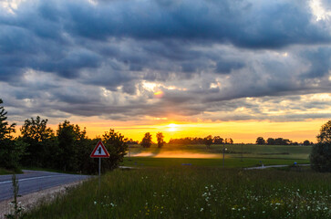 road into the sunset in a field near the village1