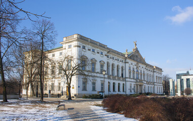 Fototapeta na wymiar Baroque style Krasinski Palace seen from a French-style garden in winter in Warsaw, Poland