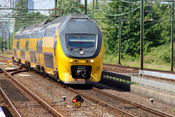 VIRM doubledeck intercity train of NS on across tation Den Haag Mariahoeve