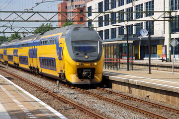 VIRM doubledeck intercity train of NS on across tation Den Haag Mariahoeve