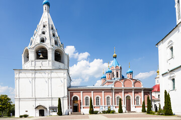 bell tower of Assumption Cathedral and Church of the Icon of the Mother of God of Tikhvin on Cathedral (Sobornaya) Square of Kolomna Kremlin in Old Kolomna city on sunny summer day