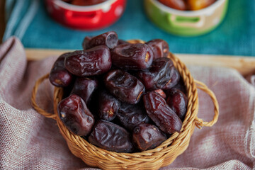 Dried dates in wicker basket