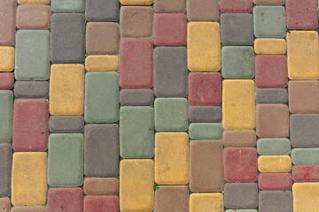 Colored pavement. Colored stone pavement. Background of colorful paving stones