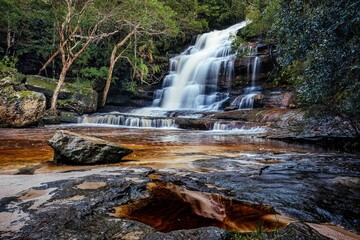 Water flowing in the waterfall and Somersby falls on NSW central coast, Australia
