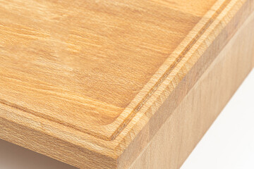 Wooden catering board isolated above white background