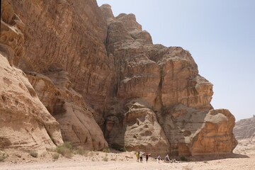 Wonderful mountain views with silhouettes of hiking people on the Jordan Trail from Little Petra...