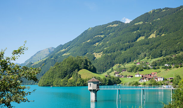turquoise artificial lake Lungerersee, canton Obwalden, with observation water tower. switzerland
