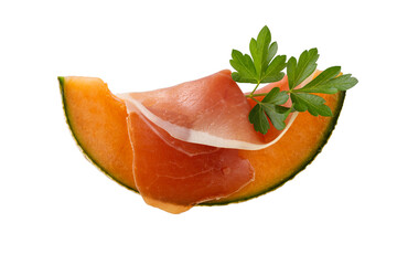 Traditional spanish jamon slice (dried pork meat) with melon and fresh parsley leaves isolated on white