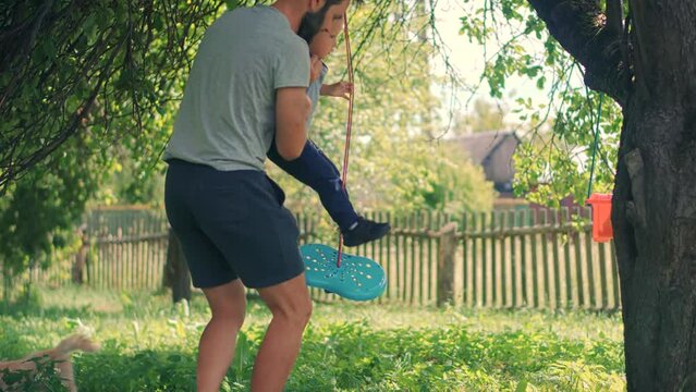 Cute Little Kid Having Fun. Carefree Preschool Son Enjoy Activity. Children Playing Family Parent Holidays Relationship With Kid Swing Ride. Happy Family Child Game Boy Leisure. Son Boy Play Happiness