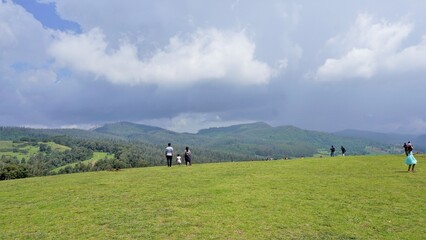 Ooty,Tamilnadu,India-June 04 2022:Tourists enjoying beautiful Wenlock Downs 9th Mile Shooting Point.