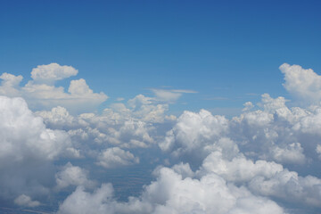 Naklejka na ściany i meble The fluffy white of the cumulus cloud with a blue sky background.