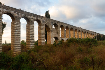 A Roman aqueduct at sunrise in Kibbutz Lohamei Haghetaot