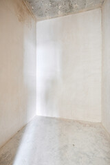 Interior of new apartment without finishing in gray tones