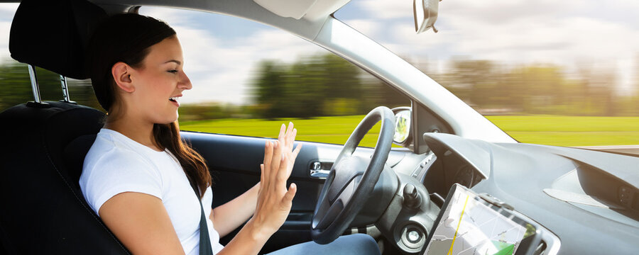 Woman Sitting In Self Driving Modern Car