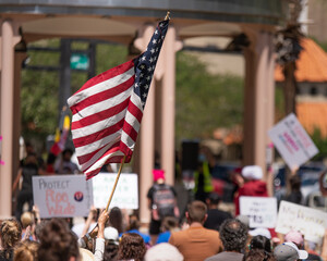 Protester Waving the American Flag at the ‘Bans Off Our Bodies’ Protests Defending Abortion...