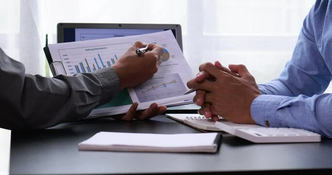 Team of Businessman working at office with documents on his desk, doing planning analyzing the financial report, business plan investment, finance analysis concept