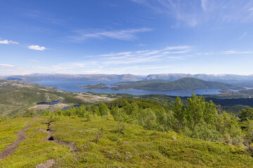 Hiking to the mountains Seterfjellet a warm and beautiful summer day, Northern Norway- Europe	