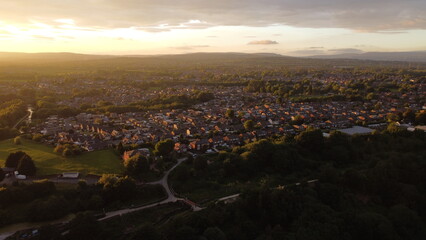 sunset city and horse view. drone shooting in green countryside