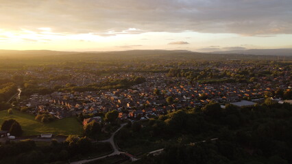 sunset city and horse view. drone shooting in green countryside