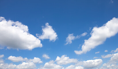 Naklejka na ściany i meble View of beautiful blue sky with white clouds. High quality photo